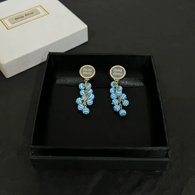 miu miu boucles doreilles pour femme s_12240532